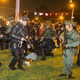 Baton Rouge, La., police rush a crowd of protesters and start making arrests July 9, 2016. The protests were a result of the fatal police shooting of Alton Sterling outside a convenience store July 5, 2016.